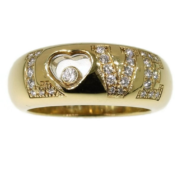 Signed Chopard love ring with happy diamond in heart shape and brilliants (image 2 of 14)
